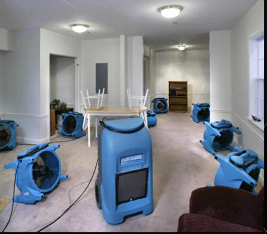 Air movers and dehumidifier setup for Water Damage Restoration in Branson